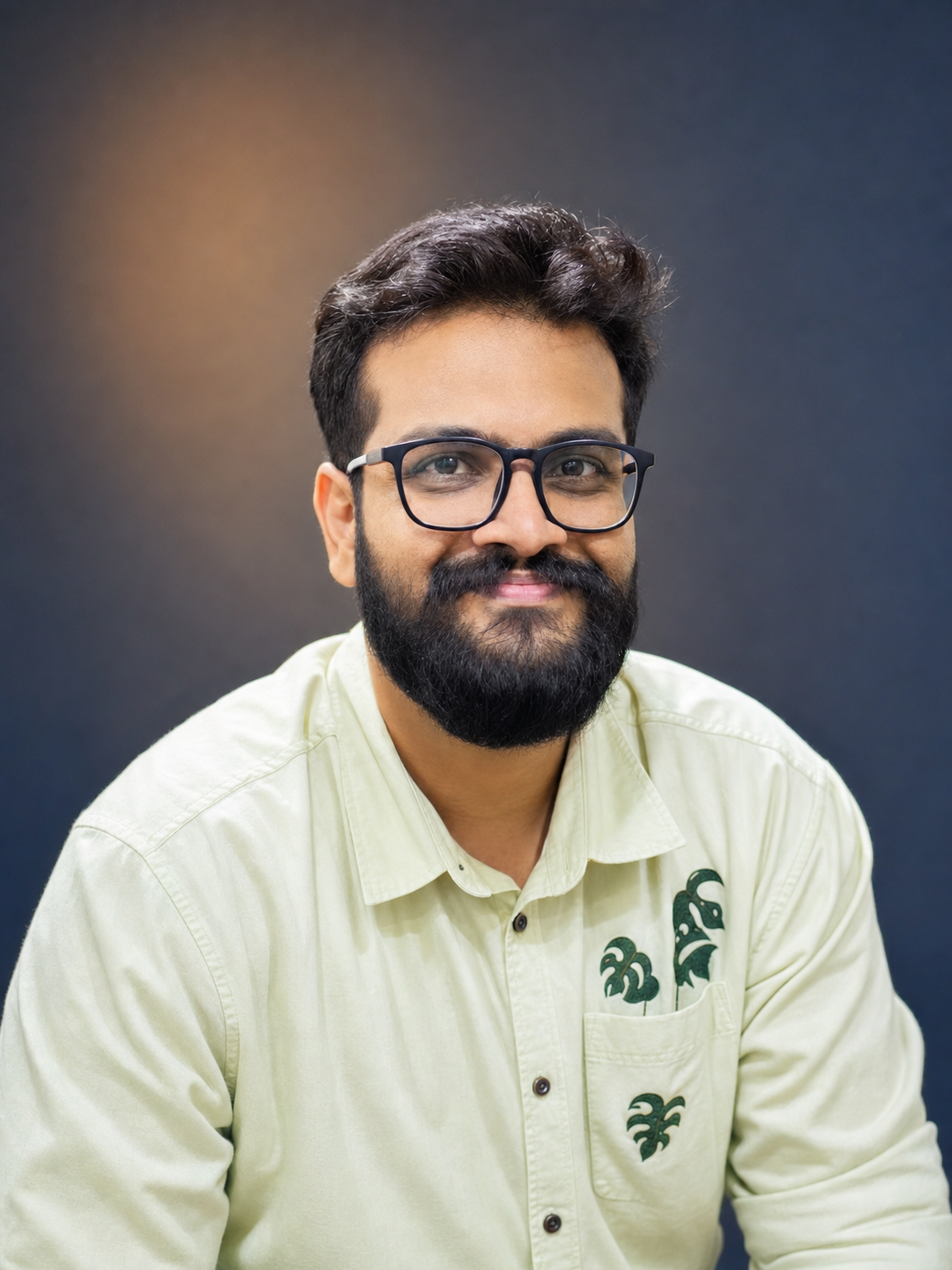 Suket Dedhia, filmmaker, editor and photographer, in a warm editorial portrait